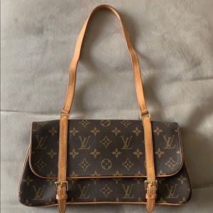 Authentic Louis Vuitton Marelle shoulder bag.
